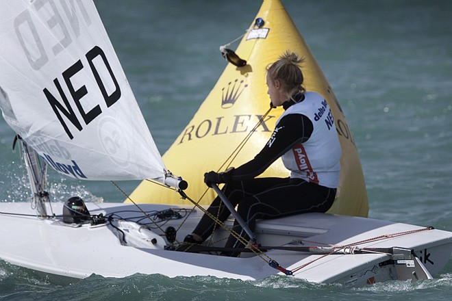 Dutch Laser Radial sailor Marit Bouwmeester sheets in - Rolex Miami OCR 2011 &copy;  Rolex/Daniel Forster http://www.regattanews.com